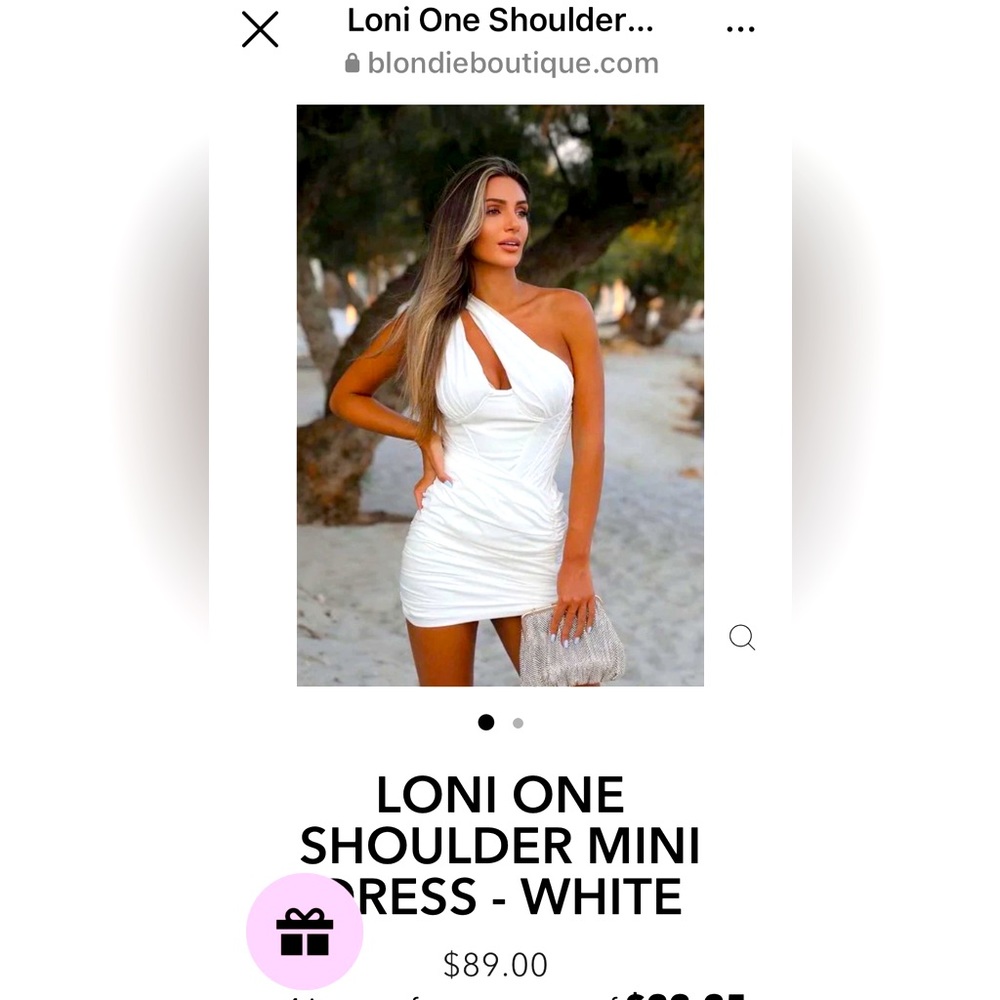 Gorgeous white cocktail dress from Blondie Boutique.